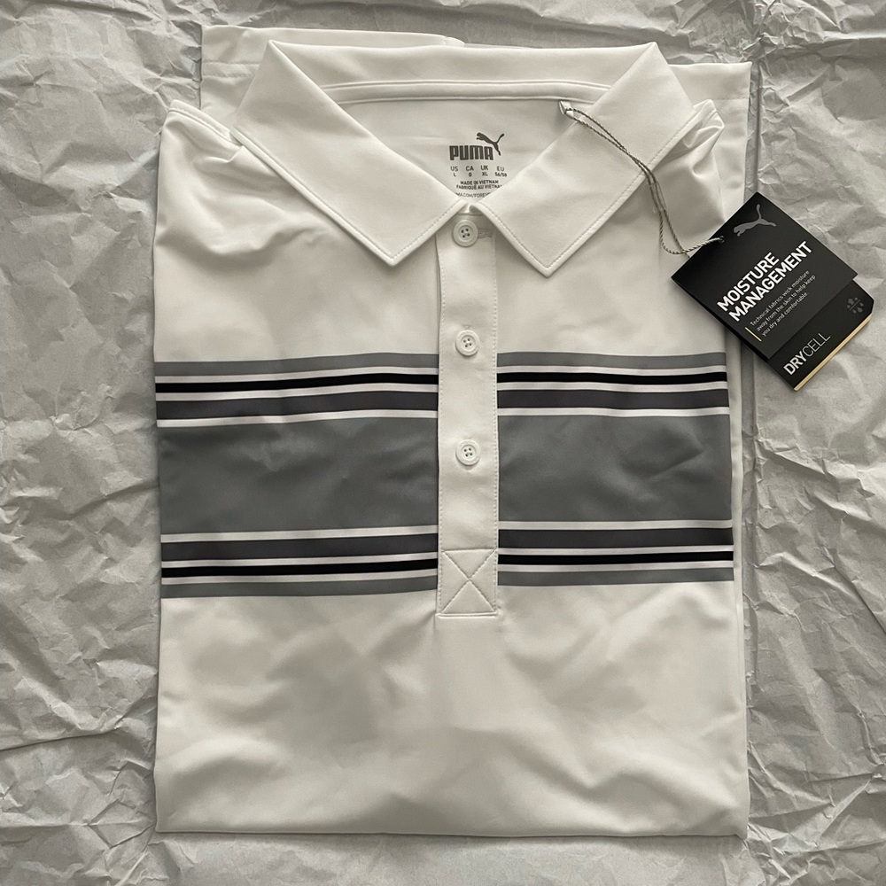 Puma Golf Dry Cell polo with Roca Patron logo on sleeve